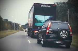 semi truck in front of a car