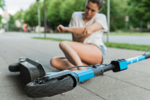  woman suffering  after e-scooter riding accident