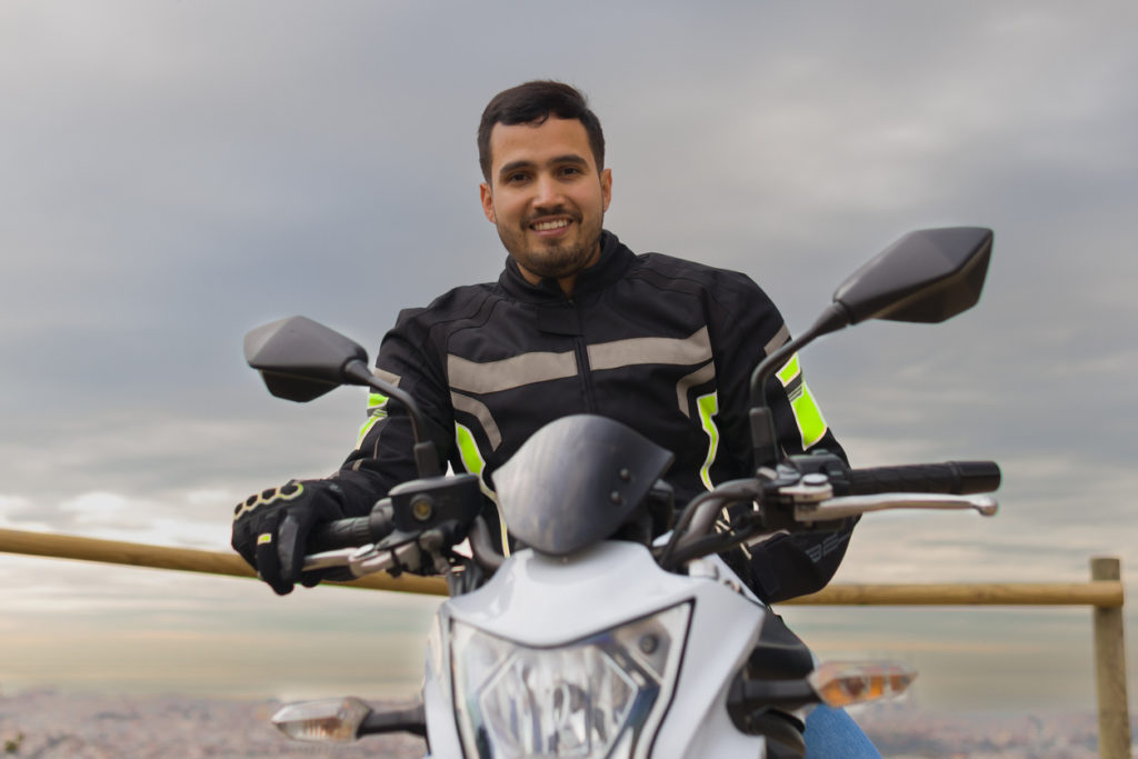 Hispanics man riding motorcycle
