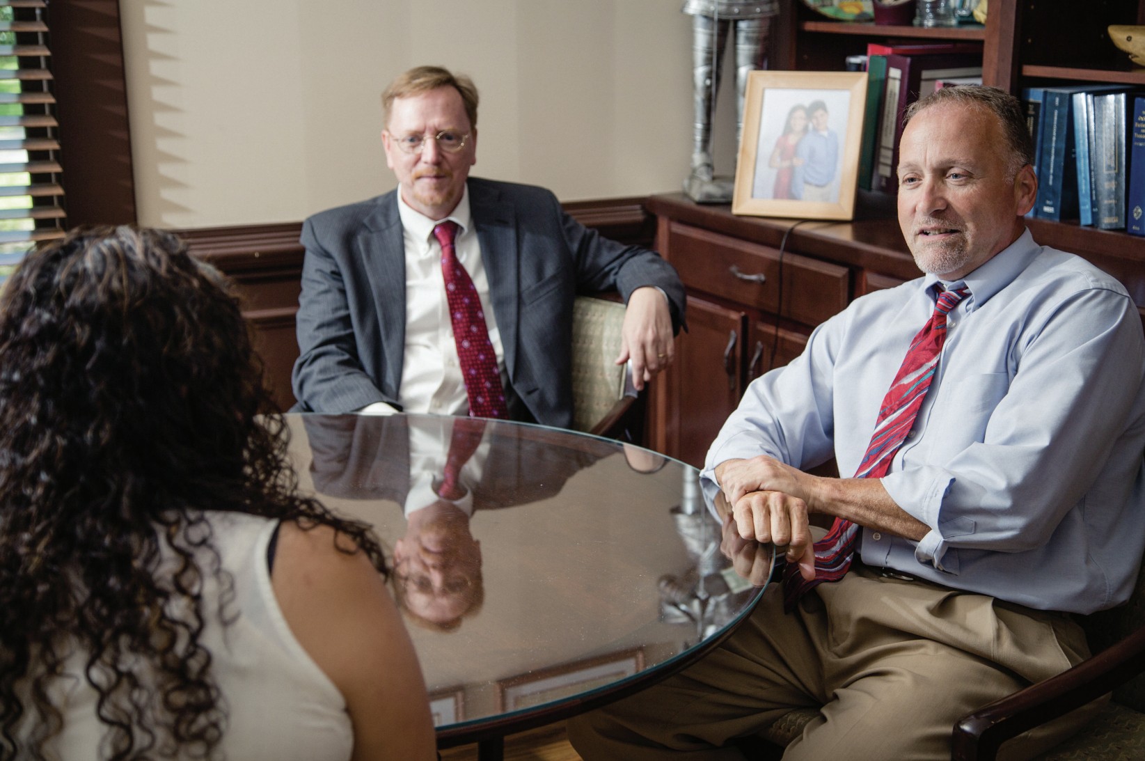 The Millar Law Firm attorneys meeting with a client